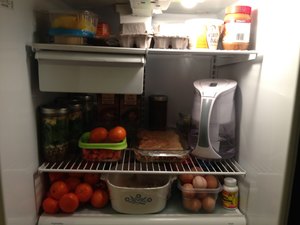 Refrigerator photo taken after Sunday food prep last year (includes canning jar salads)