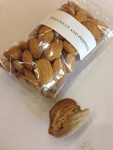 Almonds harvested the day before we got them. Bottom right = almond in a shell and hull